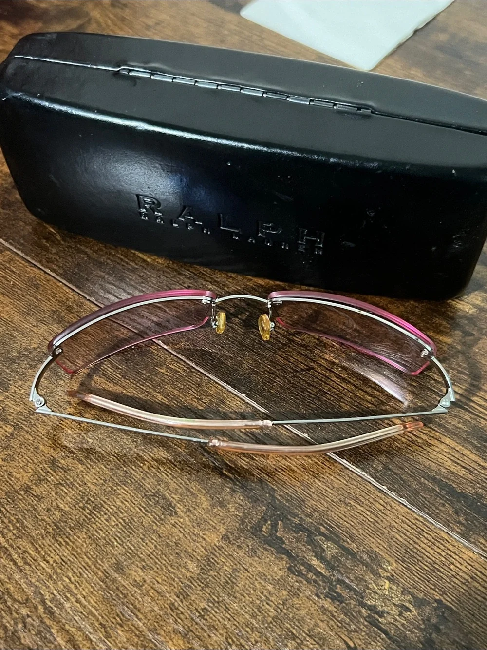 Ralph Lauren women’s Brown-Tinted Rimless Sunglasses pink